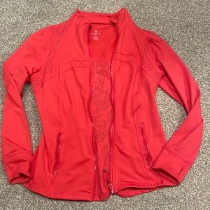 Adorable Tangerine Vented Zip up has it all!!